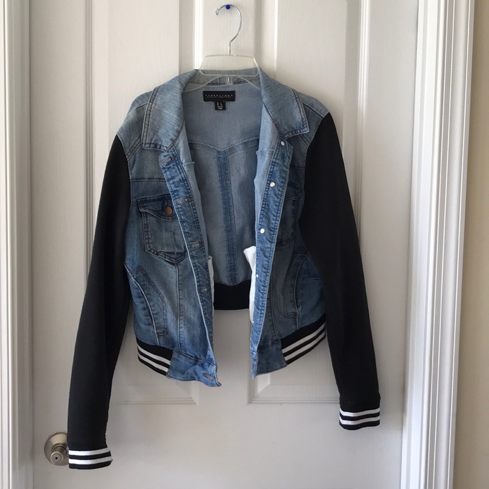 Denim jacket with black sleeves
